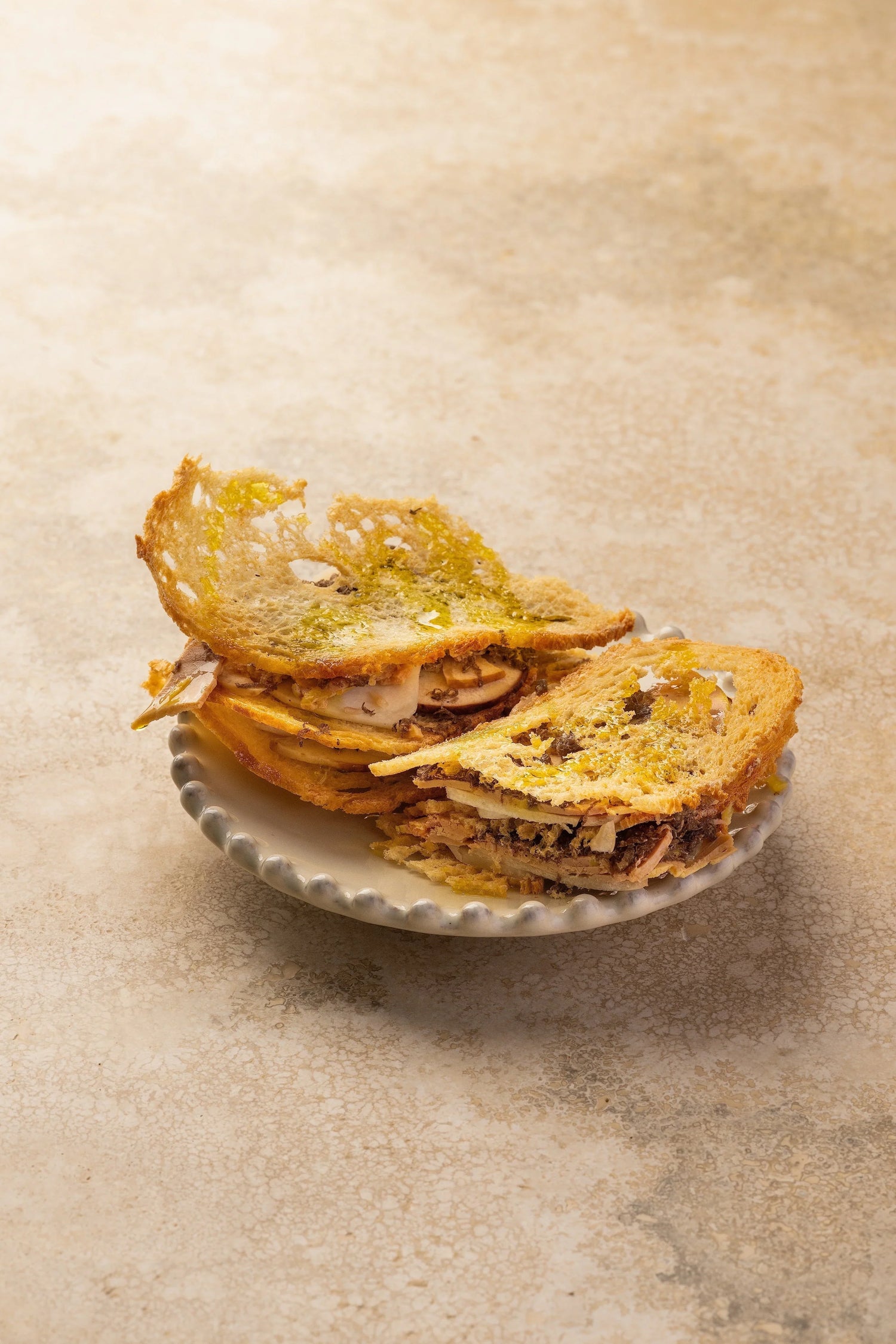 Crispy Sourdough Bread Mille-feuille with Porcini Mushrooms, Foie Gras, and Black Truffle